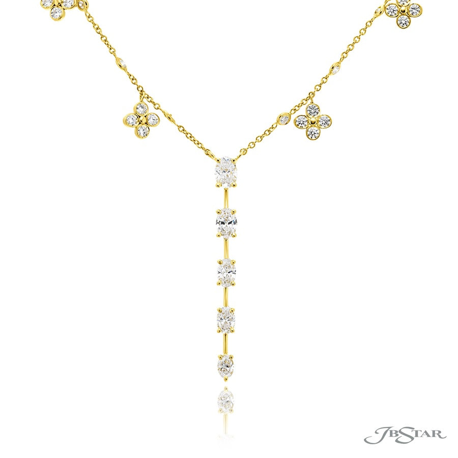 Exquisite Style: Our Timeless Diamond Drop Floral Pendant  Oval Diamond Drop with Round Diamond Floral Chain in 18K Yellow Gold