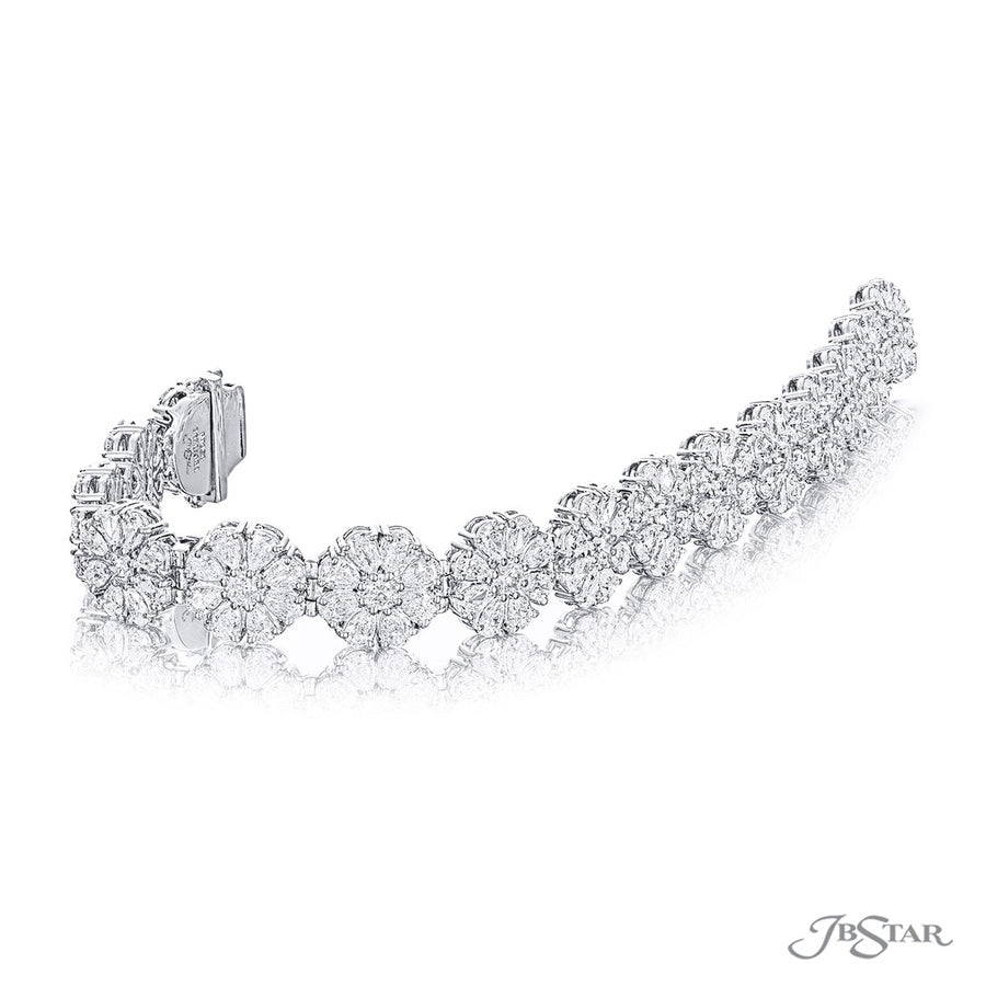 Pear shaped and round diamond bracelet floral design