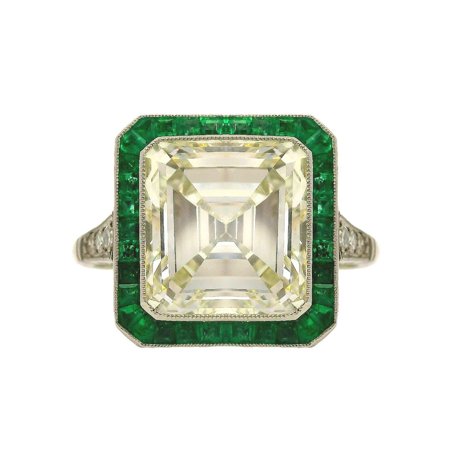 Vintage Emerald-Cut Diamond Ring with Emerald Halo