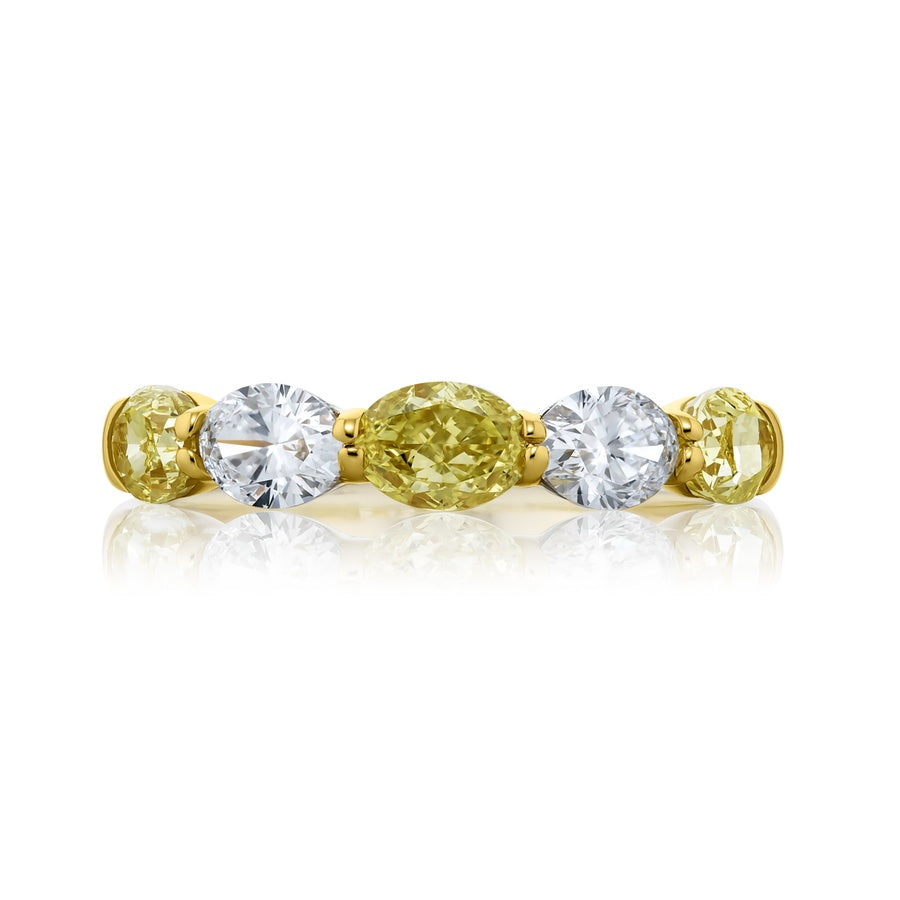 Platinum and 18K Yellow Gold Oval Fancy Yellow Diamond Single-Row East-West Band