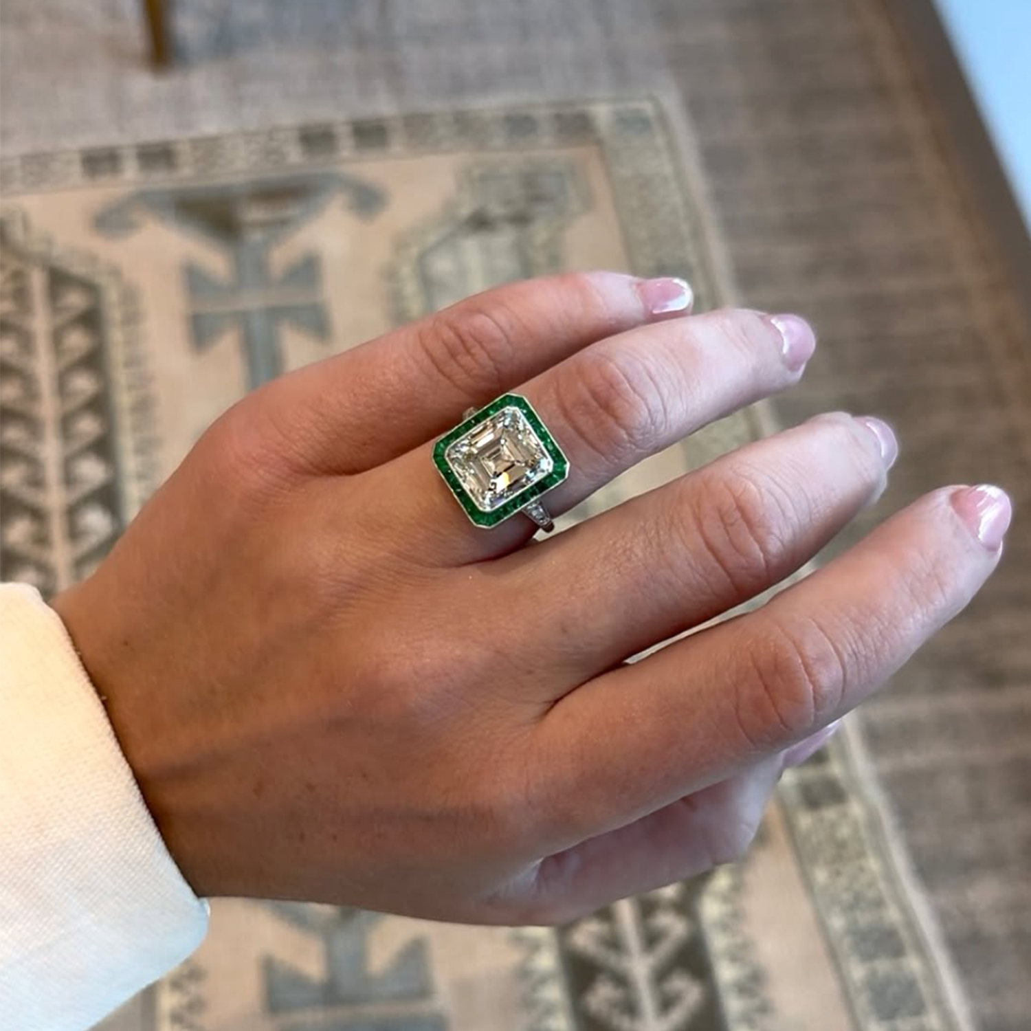 Vintage Emerald-Cut Diamond Ring with Emerald Halo